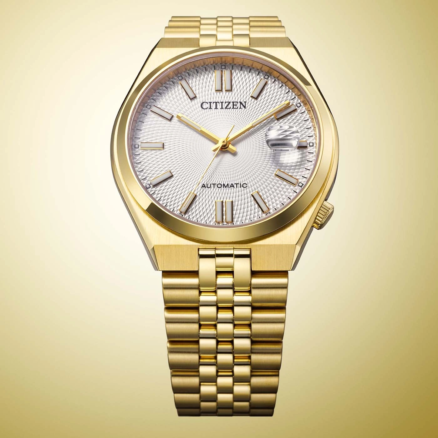 Goldene Citizen Automatikuhr auf goldenem Hintergrund.