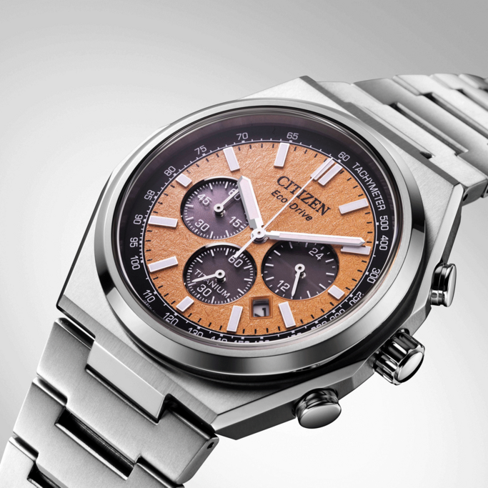 Citizen-Uhr mit orangefarbenem Zifferblatt, Titan, Chronograph, Eco-Drive und Tachymeter.