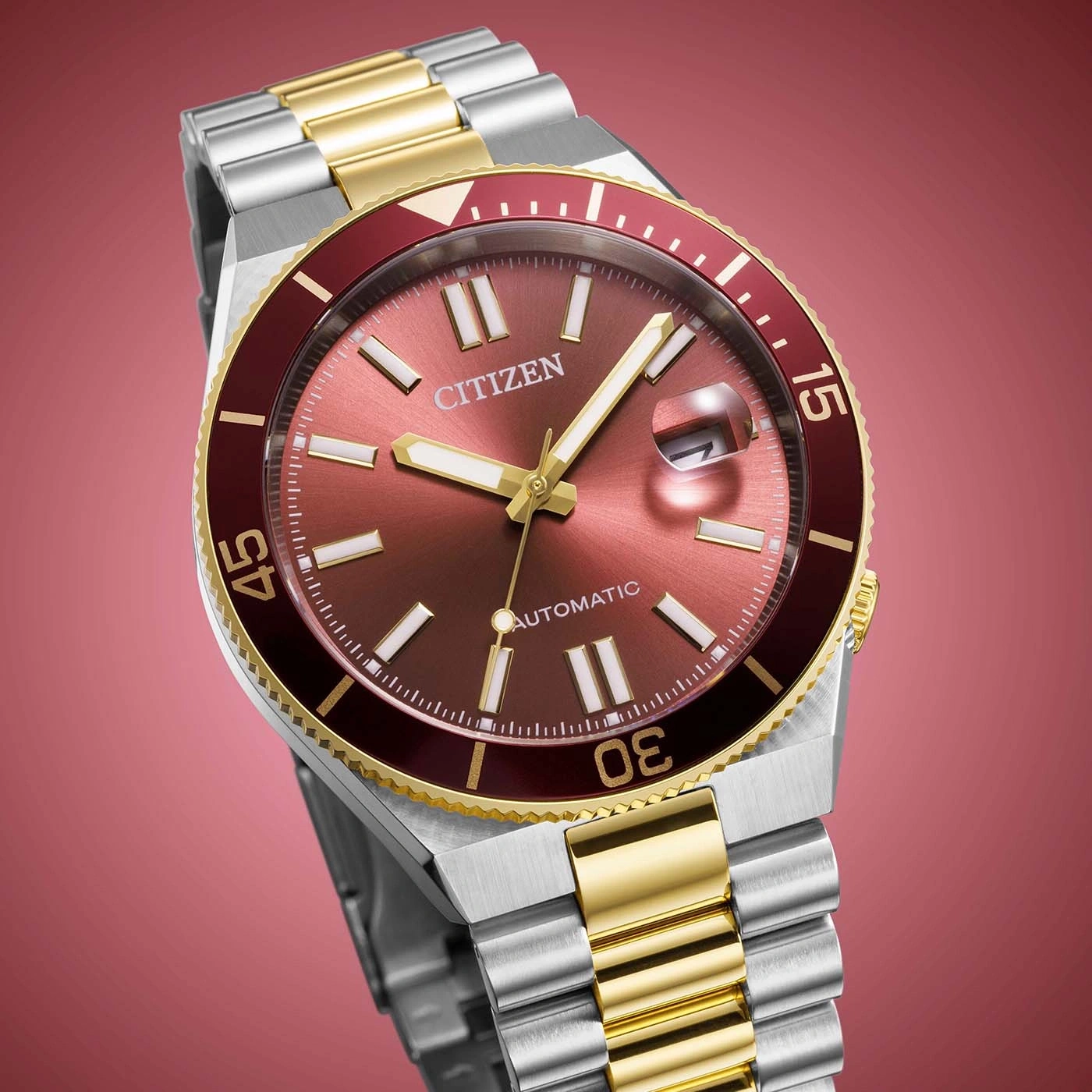 Citizen Automatik-Uhr zweifarbig mit bordeauxfarbenem Zifferblatt und roter Lünette.
