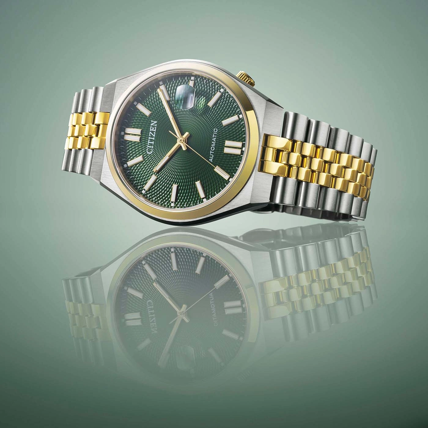 Montre Citizen homme acier et or avec cadran vert
